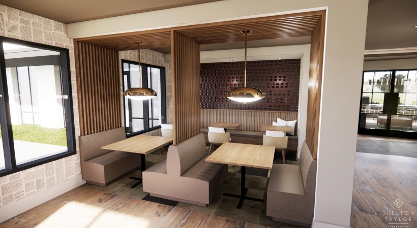 a clubroom with tables and booths