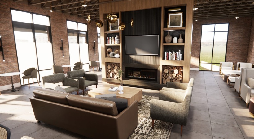 a clubroom with a couch, tv and chairs